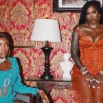 Simi and Tiwa Savage pose in a promotional photo